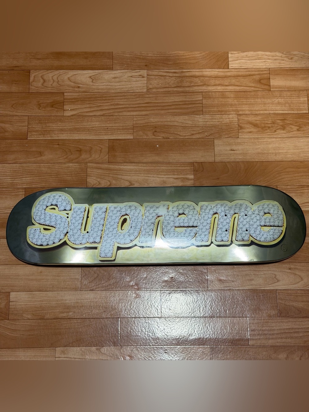 Supreme Metallic Gold Skateboard Deck with White Logo